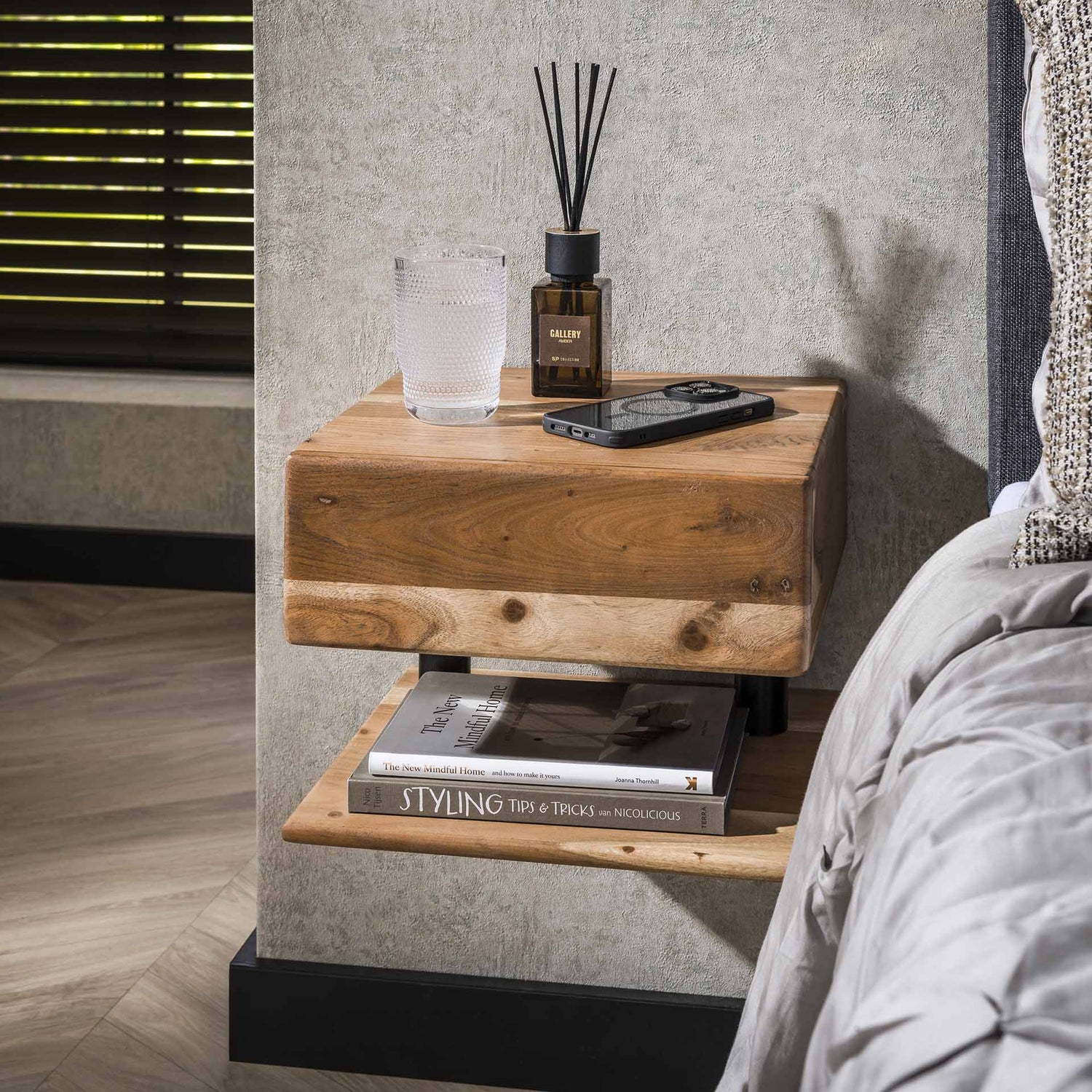 Norvik bedroom décor — floating nightstand styled in a warm bedroom
