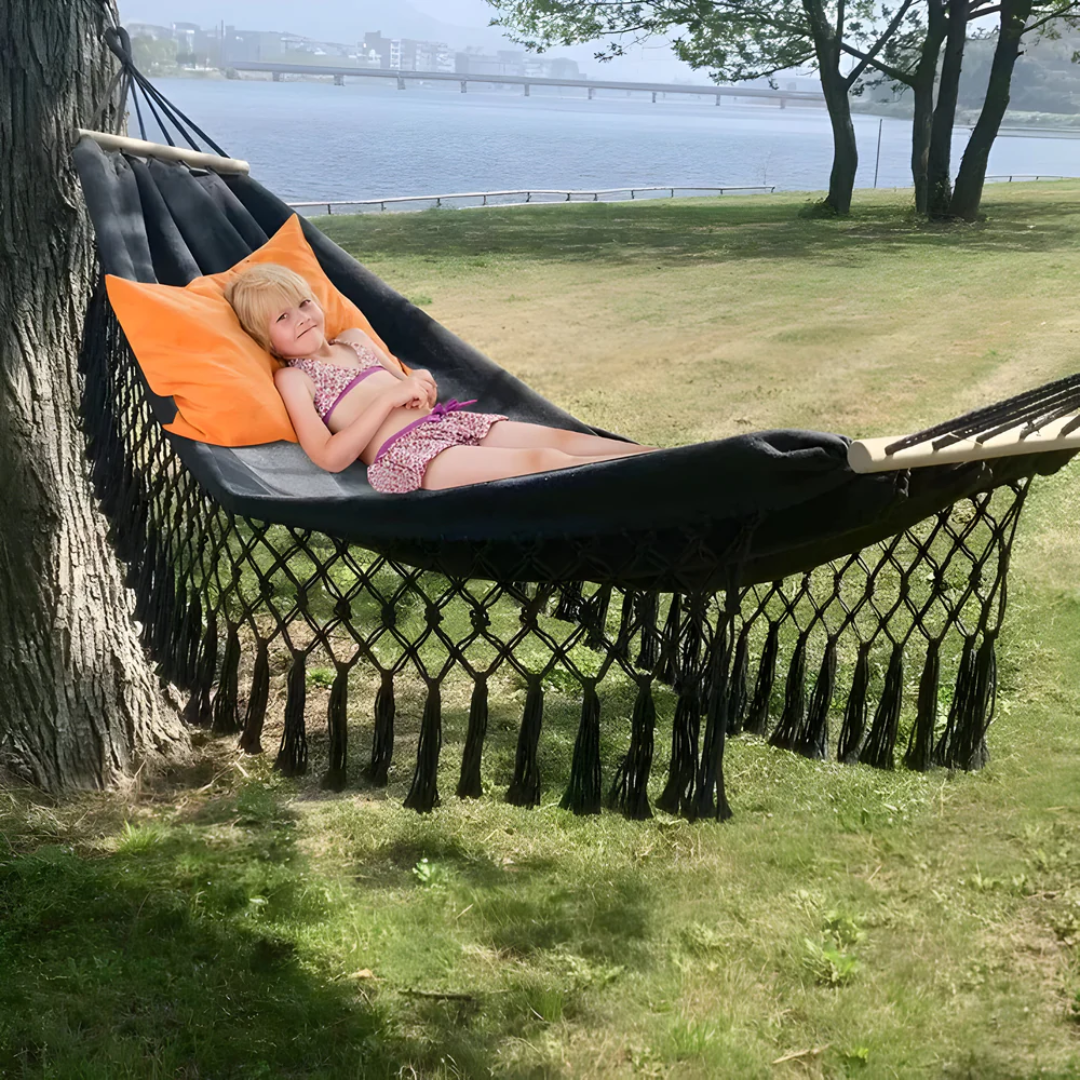 Norvik outdoor décor — cotton hammock by the water